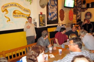 Milwaukee Newspaper Guild President Tom Silverstein speaks to members about contract negotiations and the Guild’s United Way fund drive at the Old German Beer Hall on Oct. 24. Social chair Jan Uebelherr planned the “Beer and Bargaining” event.